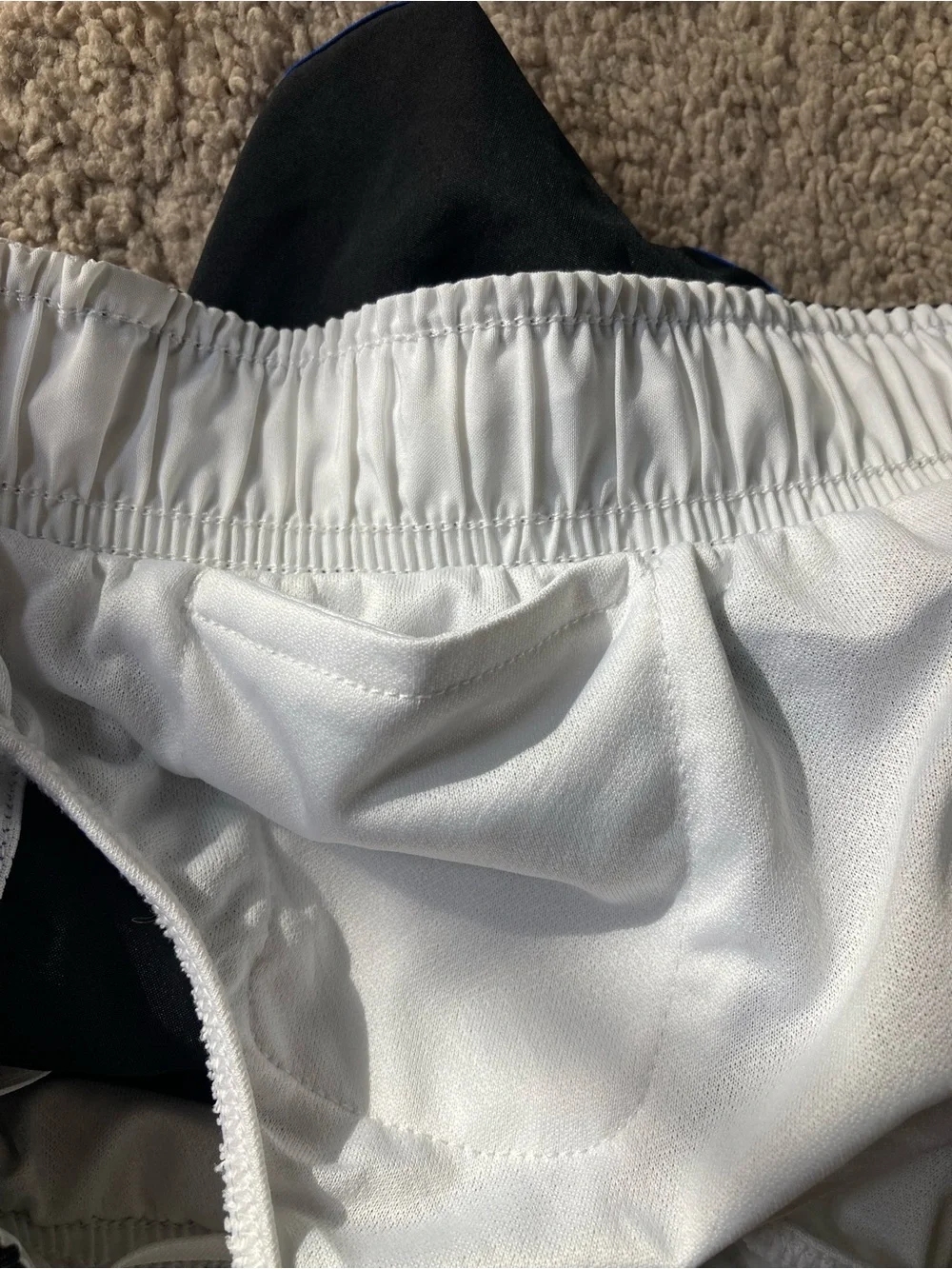 Nike Black Women's Athletic Shorts with Blue Trim